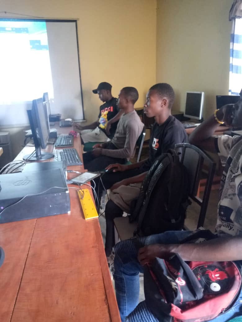 Participants in a computer training room